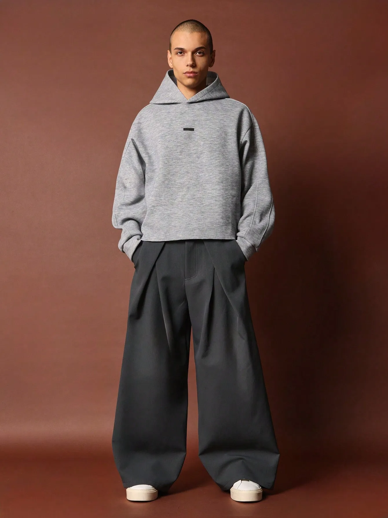 Crop Fit Overhead Raw Hem Hoodie With Silicon Badge